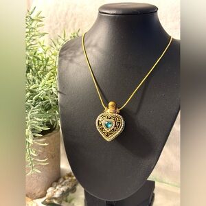 Vintage Style Gold Heart Pendant Necklace with Blue Gem